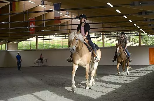 Riding in the riding arena