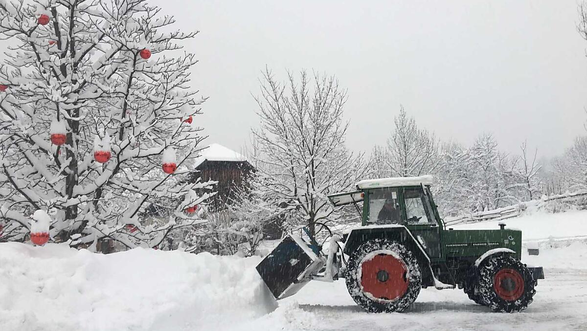 Clearing snow with the tractor