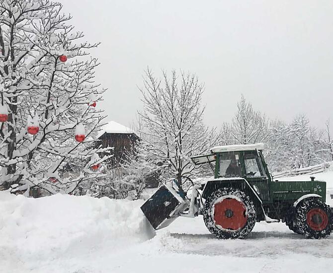 Clearing snow with the tractor
