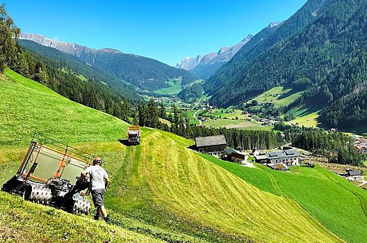 Work going on in the meadows high up in the mountains is a sight that our guests enjoy watching from the sunny terrace.