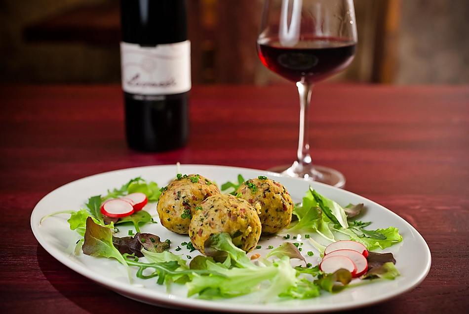 Speck dumpling with salad