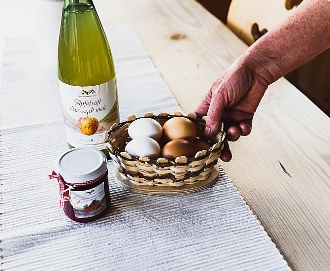 Homemade fruit spread, naturally cloudy apple juice and eggs from our chickens