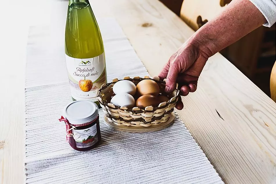 Homemade fruit spread, naturally cloudy apple juice and eggs from our chickens