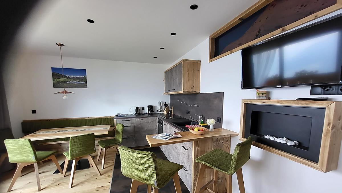 Kitchen and living room in the 'Waldesduft' apartment