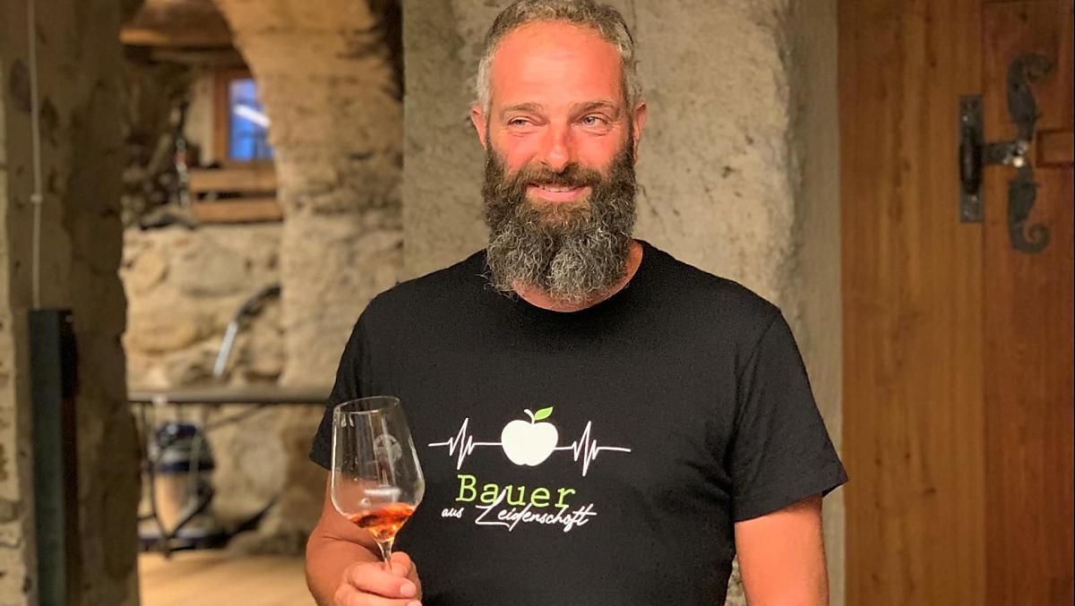 Farmer Matthias tasting wine