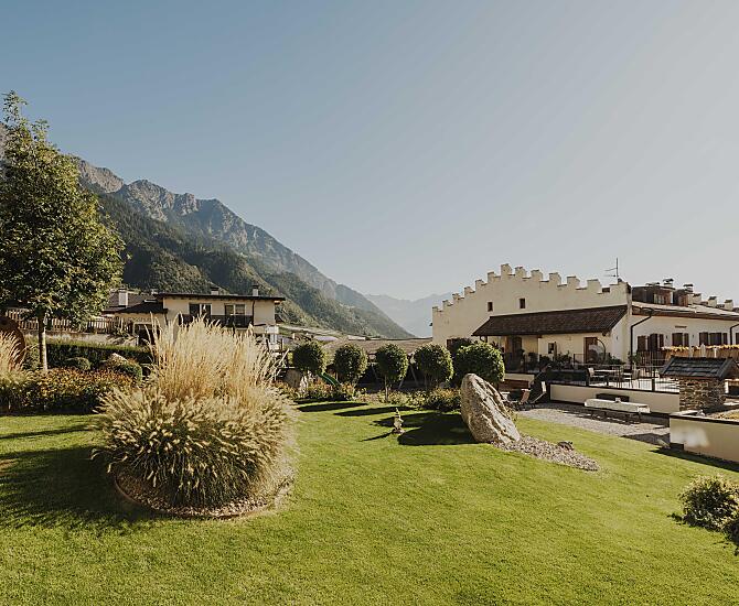 800-year-old house with large garden and relax zone for guests. Children can run around and play and explore the playground.