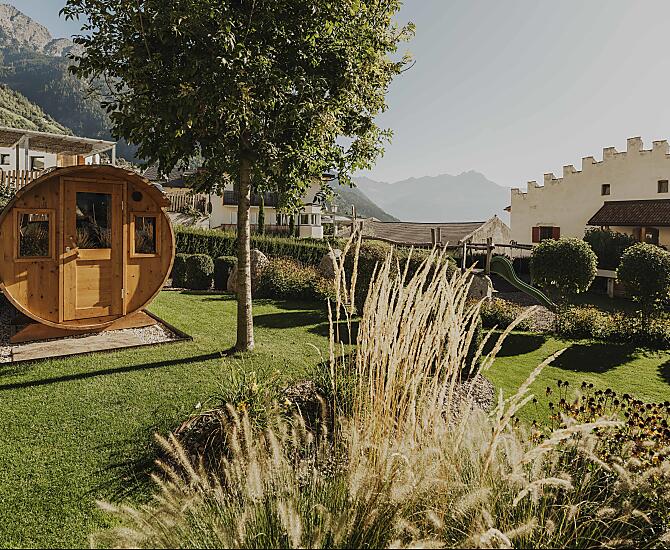 The house with its distinctive roof terraces and garden sauna.