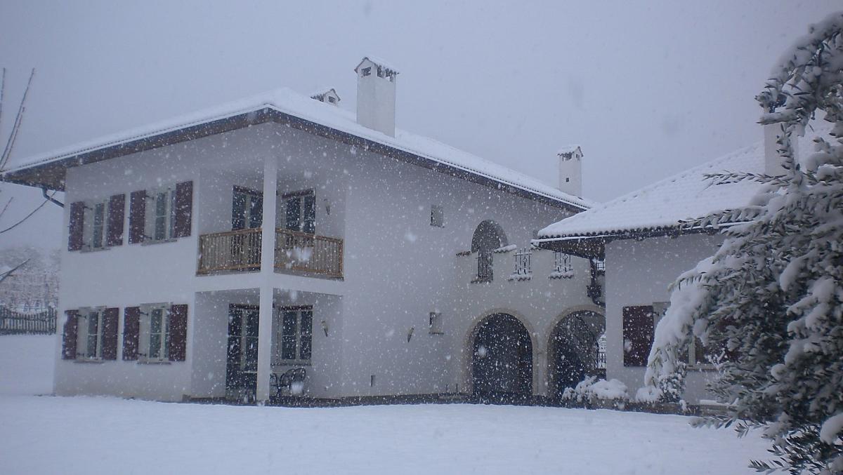 Our house in the winter landscape in the snow