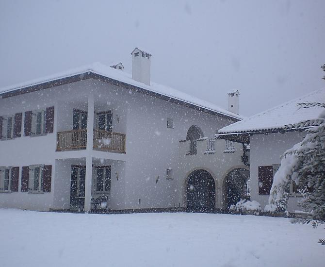 Our house in the winter landscape in the snow